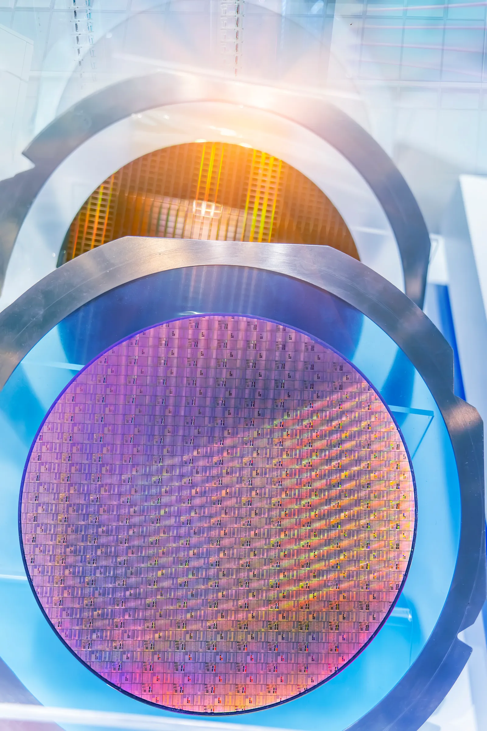 Silicon wafers held in a cassette inside a cleanroom