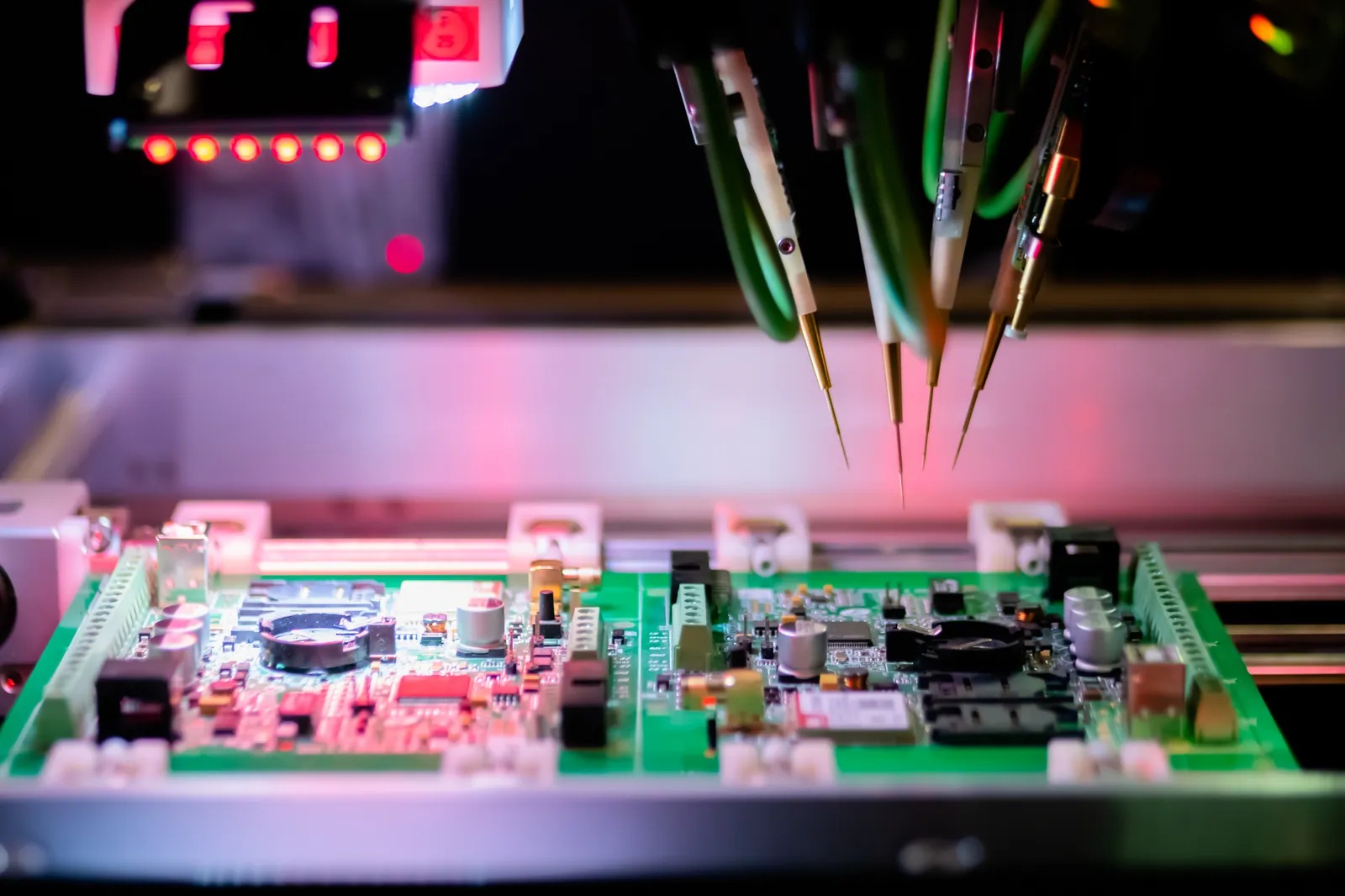 Flying probe test machine checking the quality of printed circuit boards