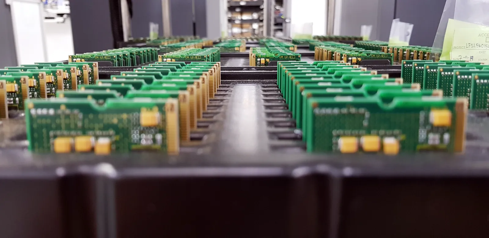 Assembled printed circuit boards arranged in a tray